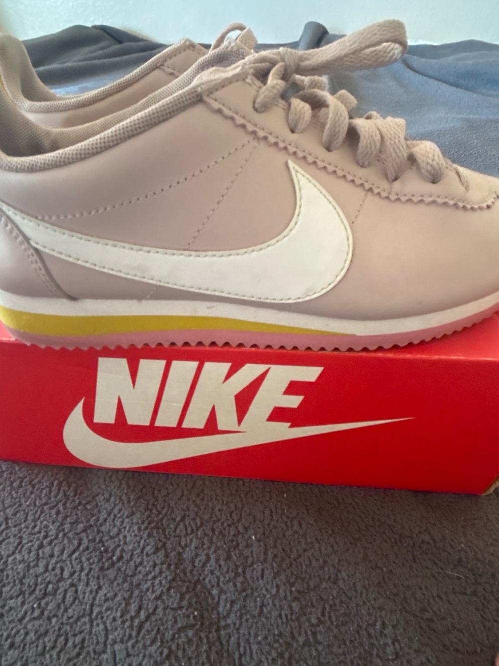 Nike Women’s Classic Cortez Sneakers in Light Pink with White Swoosh